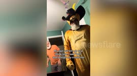 Father and daughter tear up Shrek-themed rave with dad rocking Puss in Boots onesie