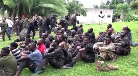 Democratic Republic of the Congo: Members of DR Congo army surrender after crossing the border into Rwanda