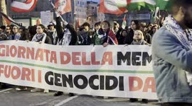 Israel-Hamas war: Protesters chant and wave Palestinian flags behind the banner reading ‘Remembrance Day, Genocide Out of History’ during Palestine Support Rally ahead of Remembrance Day in Rome.
