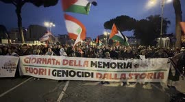 Israel-Hamas war: Protesters shout slogans and wave Palestinian and Lebanese flags behind the banner reading ‘Remembrance Day, Genocide Out of History’ during Palestine Support Rally ahead of Remembrance Day in Rome.