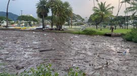 River of trash in Waikiki hawaii | after heavy rain the Ala Wai Canal is full of trash. matresses, pillows, emtpy canisters, plastic bags…  not far from there pepppe pay $400 per night to stay at a hotel and lay at beautiful Waikiki beach