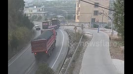 Dramatic moment driver leaps from vehicle moments before it crashed into another truck