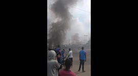 Congo rioters light fires and attack buildings in protest at foreign governments