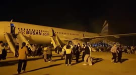 Passengers use emergency slides as fire starts on plane in South Korea