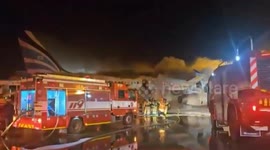 Fire crews battle blaze engulfing plane in South Korea