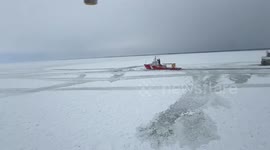 US: Ice-Bound Freighter Manitoulin Awaits Rescue on Frozen Lake Erie