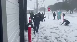 Police go head-to-head with firemen in snowball fight in Houston