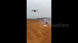 Drone and robot dog face off in futurists firework battle straight out of a sci-fi film