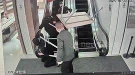 Chaos in Shanghai mall as table gets struck on escalator, forcing shoppers to flee backwards