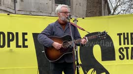 Billy Bragg performs in support of jailed climate activists outside Royal Courts of Justice