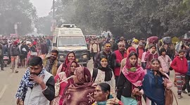 India's bathing festival continues hours after 30 die in stampede