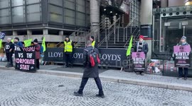 Climate activists from Extinction Rebellion demonstrate against fossil fuel insurers at Lloyd's of London in the City of London