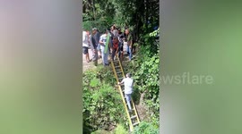 French tourist, 70, rescued after crashing motorcycle down hillside in Indonesia