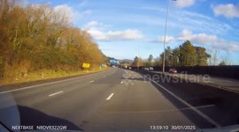Police tactical stop after persuit on a car on the M4 motorway westbound near Newport, Wales.