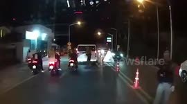 Tourists speed though police checkpoint to avoid being fined