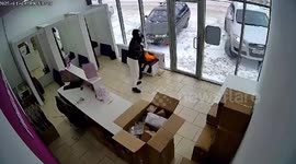 Audi driver crashes into post office while trying to park