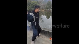 Karma! Man tossing firecracker into pond accidentally flings iPhone into water