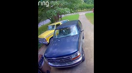 Car collides and rolls downhill in Marietta, Georgia, USA