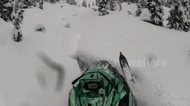 Sled falls into creek during ride in Prince George, Canada