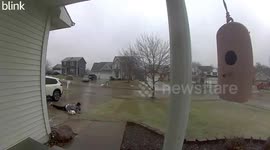 Person slides on the ground in Des Moines, Iowa, USA