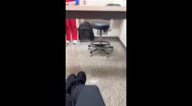 Dog pulls away from a vet tech in Youngstown, Ohio, USA