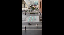 Dog enjoys playing in mall fountain in Parañaque, Philippines