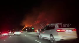 Firestorm burns 40 acres near Getty Center in Los Angeles, California, USA
