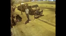 Dog playfully startles man in Nonthaburi, Thailand