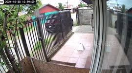 Woman falls after exiting house in Temuco, Chile