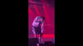 Singer accidentally spills water on audience during concert in Santiago, Chile