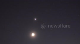 ISS International Space Station flies below Saturn, Moon, Venus in evening sky Switzerland