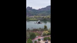 EVTOL soars over world heritage Danxia Mountain