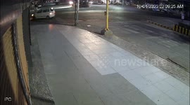 Speeding car clipped at roundabout and crashes in India