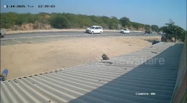 Out-of-control car crashes into pit on highway in India