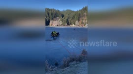 Wild deer stranded on frozen lake rescued in Oregon
