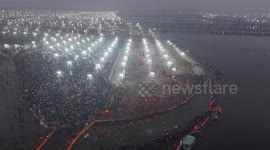 Drone footage shows millions of devotees bathing during Maha Kumbh festival in India