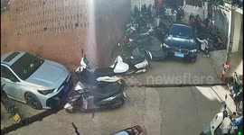 Bungling BMW driver runs himself over with his own car