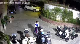 Boy chases scattered papers in windy Fujian, China