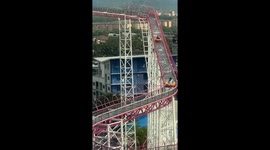 Exclusive- Terrifying moment as visitors get stuck on glass slide in Malaysia