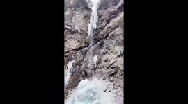 Frozen waterfall falls on people in Shaanxi province, China