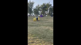 Father and son fall off balloon while playing on slide in Guangdong, China
