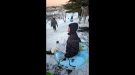 Snow tubing mishap in Olathe ends in fall over ice edge