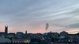 Stunning murmuration of Starlings over Penzance at Sunset as viewed from the harbour. Lovely skyline of Penzance.