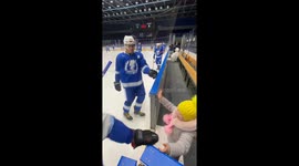 Hockey team gives toy to child in Novosibirsk