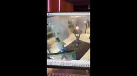 Girl struggles to catch both elevators in Moscow