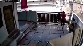 Father saves baby from falling in Hyderabad, India