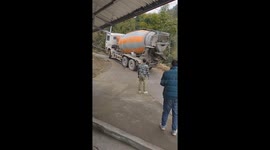 Concrete mixer truck accidentally falls into ravine in Sichuan, China