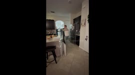 Siblings surprise parents with a 98-inch TV in Florida, USA