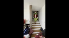 Boy chases Grinch after Christmas surprise in Mandatoriccio, Italy