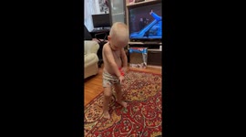 Child dances with glowing ball in pants in Krasnodar, Russia